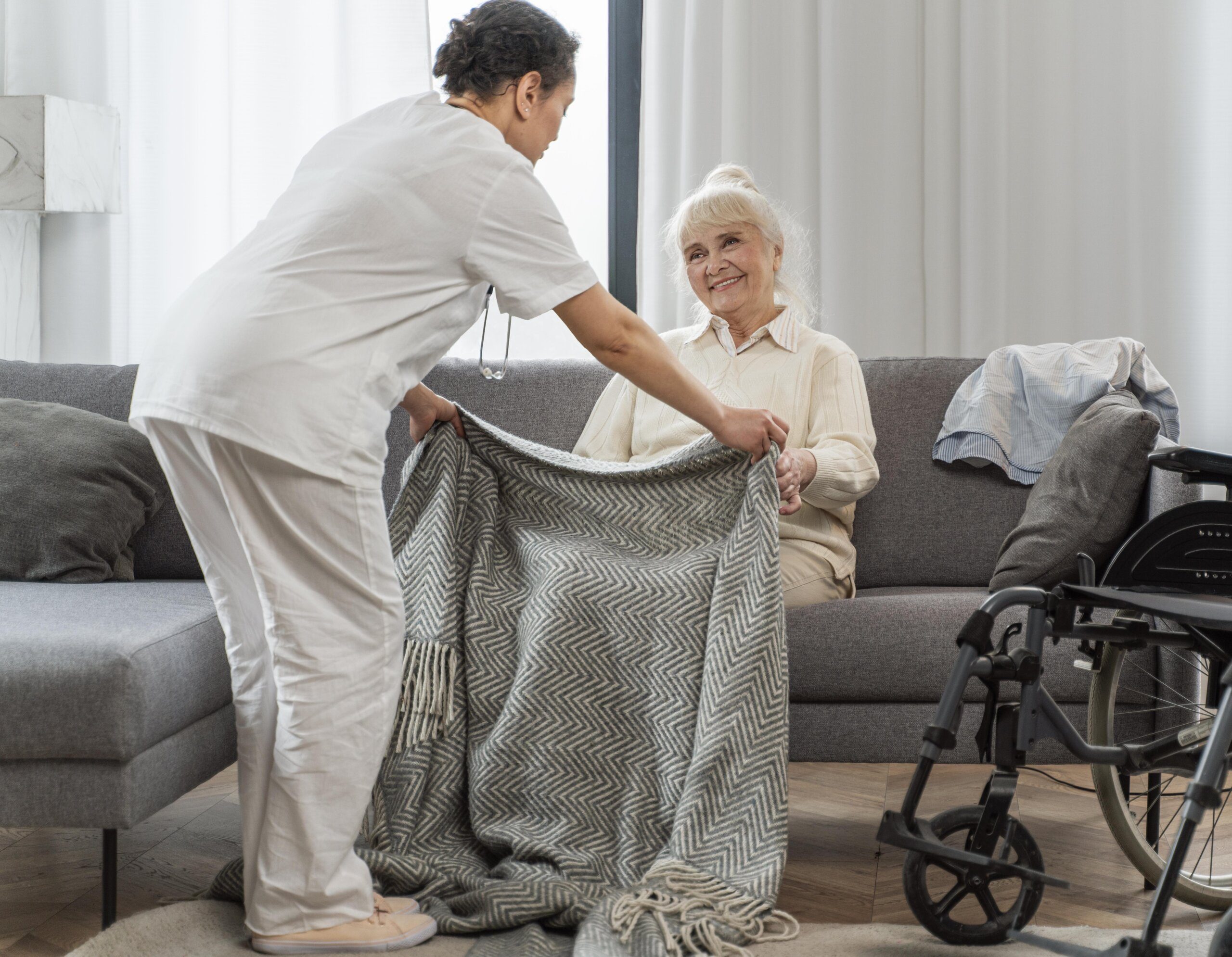 doctor-taking-care-senior-woman-home-1-scaled-1.jpg